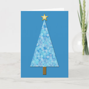 Blaue Blumen auf einem modernen Weihnachtsbaum Feiertagskarte