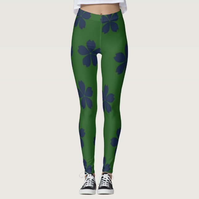 Blaue Blumen auf grünem Hintergrund Leggings (Vorderseite)