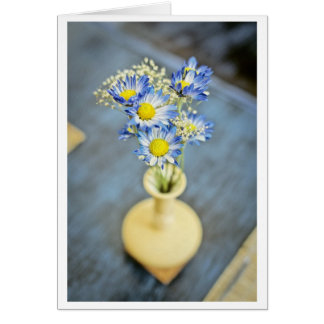 Blaue Blumen in einer Vase