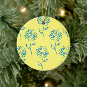 Blaue Blumenumrandung auf gelbem Hintergrund Keramik Ornament