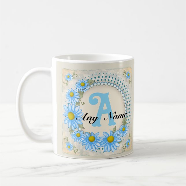 Blaue Daisy-Monogramm-Tasse Kaffeetasse (Links)