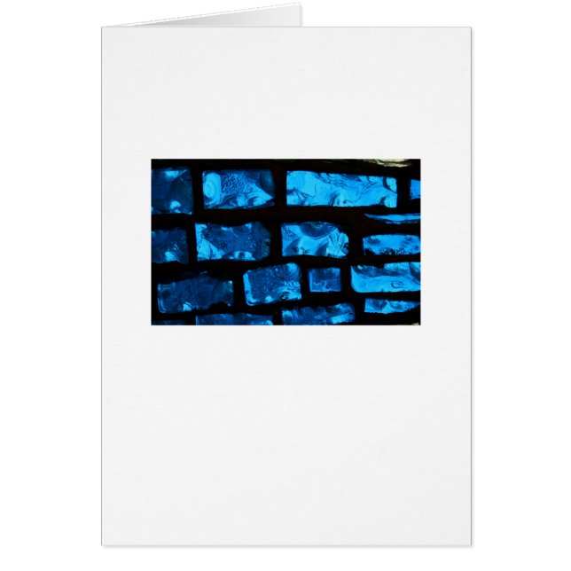 Blaue Glasklumpen mit schwarzem Bewurf zwischen (Vorne)