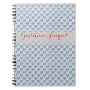 Blaue Herzen auf grau Notizblock