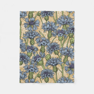 Blaue Maisblumen, wilde Blume auf Honiggelb Fleecedecke