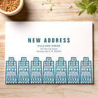 Blaue neue Adresse mit Retro-Cartoon-Gebäude