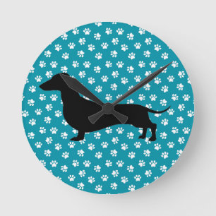 Blaue Pfotenabdruck-Dachshund-Silhouette-Wanduhr Runde Wanduhr
