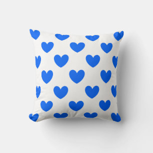 Blaue Polka-Herzen auf weiß Kissen