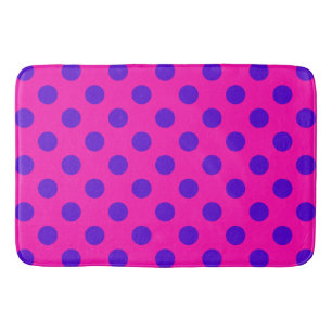 Blaue Polka-Punkte auf Fuchsia Badematte