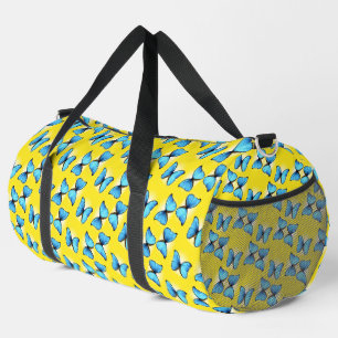 Blaue Schmetterlinge auf Gelb Duffle Bag