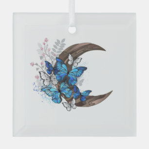 Blaue Schmetterlinge auf hölzernem Halbmond Ornament Aus Glas