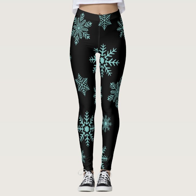 Blaue Schneeflocken auf schwarzen Leggings (Vorderseite)