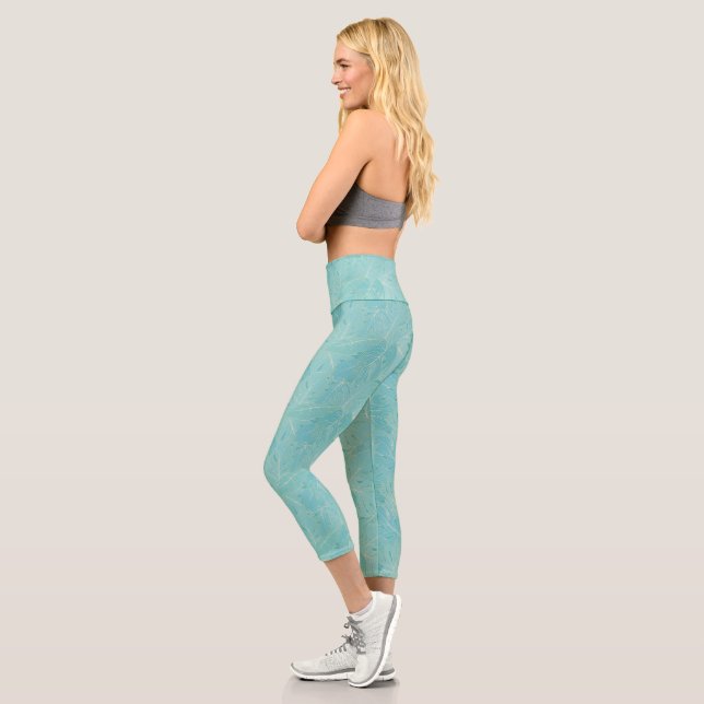 Blaue tropische Palmen-Blätter Capri Leggings (Links)