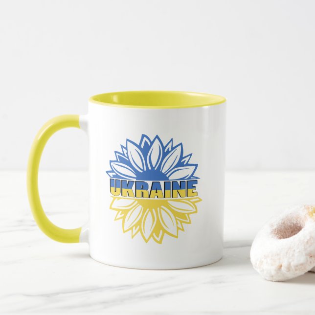 Blaue und gelbe Sonnenblume mit Inschrift Ukraine Tasse (Mit Donut)