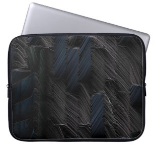 Blaue und grüne Stifte auf blauem Kunststoffbehält Laptopschutzhülle