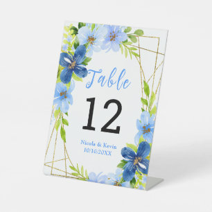 Blaue und marineblaue Blumen mit Laub Sockelschild