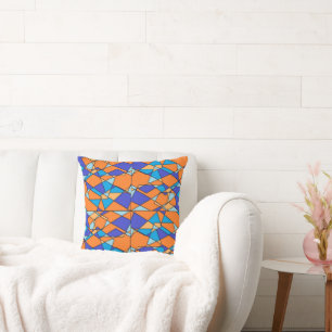 Blaue und orange Kissen mit geometrischem Design