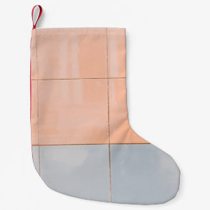 Blaue und orangefarbene Wand Kleiner Weihnachtsstrumpf