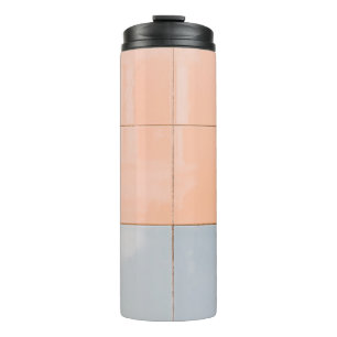 Blaue und orangefarbene Wand Thermosbecher