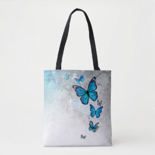 Blaue und silberne Wasserfarb-Schmetterlinge