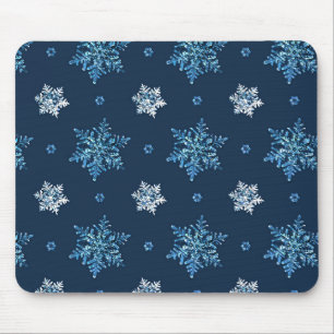Blaue und weiße Schneeflocken Mousepad