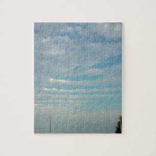 blauer Himmel mit welligen Wolken Puzzle