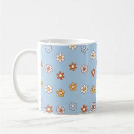 Blauer Hintergrund mit Blumen in gemischten Farben Kaffeetasse