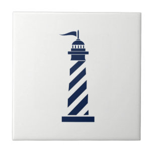 Blauer Leuchtturm auf weißer Keramik-Fliese Fliese