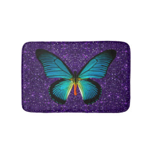 Blauer Schmetterling auf Lila Glitzer Badematte