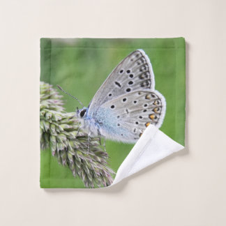 Blauer Schmetterling im Gras Waschlappen
