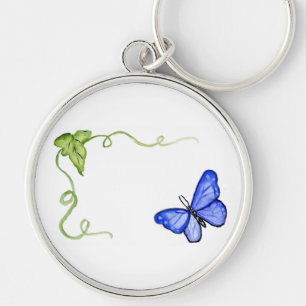 Blauer Schmetterling und grüner Schlüsselanhänger