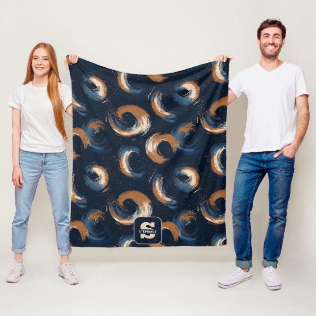 Blauer und brauner Kreis auf dunklem Hintergrund Fleecedecke (Beispiel)
