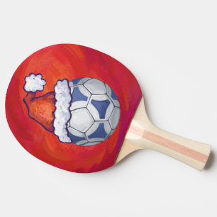 Blauer und weißer festlicher Fußball auf Rot Tischtennis Schläger