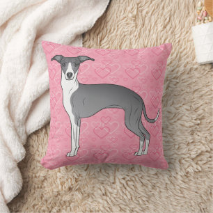 Blauer und weißer Italienischer Windhund auf rosa Kissen