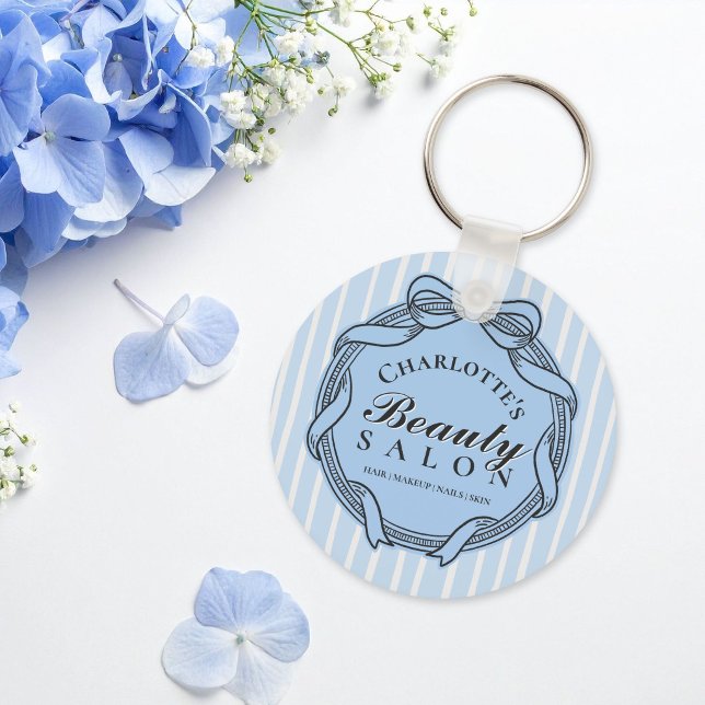 Blauer verzierter Schlüsselanhänger mit Bogenrahme (Blue Ornate Bow Frame Beauty Salon Keychain)