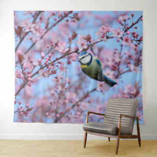 Blauer Vogel in rosafarbenen, japanischen Kirschbl Wandteppich