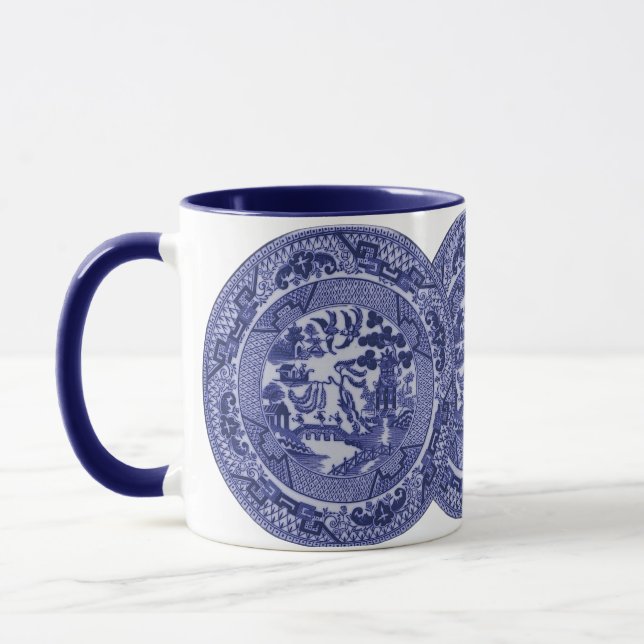 Blauer Weide-China-Teller auf Weiß Tasse (Links)
