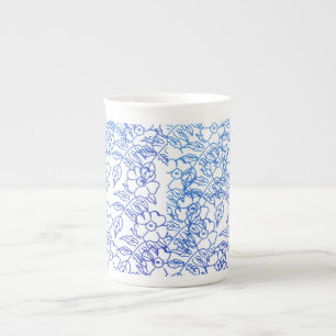 Blaues botanisches zeichnend Vintages Blumendesign Prozellantasse