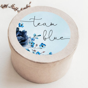 Blaues oder rosa Blumengeschlecht offenbart Teambl Runder Aufkleber