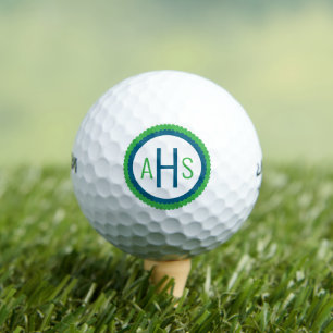 Blaues und grünes geschwungenes dreibuchstabiges M Golfball