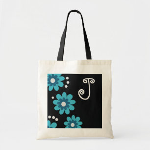 Blaues und schwarzes Blumenmonogramm Tragetasche