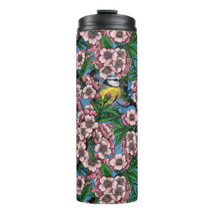 Blauzungenvögel im blühenden Kirschbaum auf blau Thermosbecher