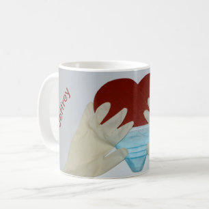 Bleiben Sie gesund mit Maske und Ihrem Namen - Kaffeetasse