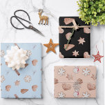 Blue Christmas Cookie Swap Exchange Geschenkpapier Set<br><div class="desc">Diese festlichen Packpapierbögen zeichnen sich durch ein charmantes Design von Weihnachtskeksen auf beige, blau und schwarz Untergrund aus, das sich perfekt für die Vervollständigung Ihrer Urlaubsgeschenke eignet. Passen Sie die Blätter mit einem Namen oder einer speziellen Nachricht an, um eine persönliche Touch hinzuzufügen. Ideal für Verpackungen aller Größen während der...</div>