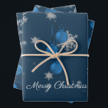 Blue Christmas Ornament Wrapping Paper Sheets Geschenkpapier Set<br><div class="desc">Wrap Geschenke für unter den Weihnachtsbaum in dieser Weihnachtszeit mit Blue Weihnachtsschmuck Wrapping Paper. Das Wrapping Paper Design zeichnet sich durch ein Trio von hängenden Weihnachtsschmuck mit fallenden Schneeflocken und einem dunkelblauen Hintergrund aus. Mit diesem Design sind auch zusätzliche Geschenk- und Urlaubsartikel erhältlich.</div>