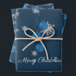 Blue Christmas Ornament Wrapping Paper Sheets Geschenkpapier Set<br><div class="desc">Wrap Geschenke für unter den Weihnachtsbaum in dieser Weihnachtszeit mit Blue Weihnachtsschmuck Wrapping Paper. Das Wrapping Paper Design zeichnet sich durch ein Trio von hängenden Weihnachtsschmuck mit fallenden Schneeflocken und einem dunkelblauen Hintergrund aus. Mit diesem Design sind auch zusätzliche Geschenk- und Urlaubsartikel erhältlich.</div>