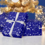 Blue Christmas Reindeer Wonder Geschenkpapier<br><div class="desc">Dieses elegante Urlaubspapier besticht durch ein weißes,  silbernes Rentier,  weiße Schneeflocken und ein hübsches silberfarbenes Design auf dunkelblauem Nachthintergrund. Der Text in Weiß sagt "Das Wunder von Weihnachten". Schön,  festlich und einzigartig!</div>