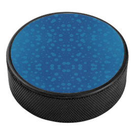 Blue circular product with a polka dot pattern  eishockey puck