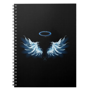 Blue Glowing Angel Wings on black background Notizblock