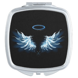 Blue Glows Angel Wings auf schwarzem Hintergrund Taschenspiegel