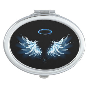 Blue Glows Angel Wings auf schwarzem Hintergrund Taschenspiegel